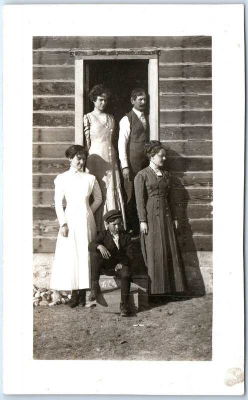 c1910s Family Portrait House RPPC Awesome Photo Cute Kids & Serious Parents A173