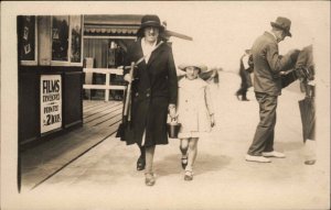 Walkie Mom & Daughter Walk in Front of Photo Studio Real Photo Postcard