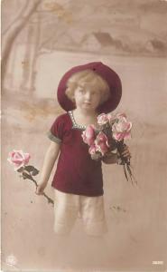 Young child with flowers Child, People Photo 1913 small crease left bottom co...