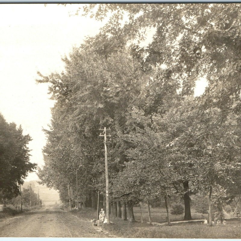 c1908 Cute Children Play Dirt Rd RPPC Farm House Real Photo Hammock Postcard A44