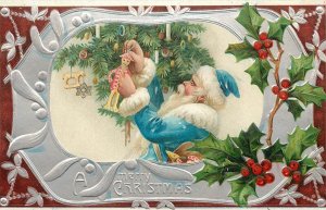 Embossed Christmas Cookie Gingerbread Man Blue Robe Santa Claus Decorates Tree