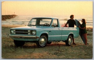 Ford Courier Truck 1980 Advertising Postcard Couple Beach Surfboard