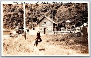 K47/ Alaska RPPC Postcard c1910 Mountain Home Mrs Schmeid Dog 212