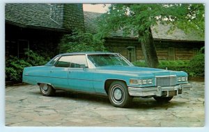 Car Advertising 1975 CADILLAC DEVILLE? 4 Door Automobile Postcard