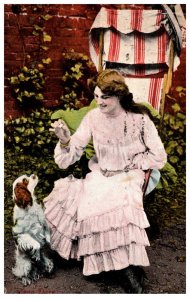 Woman feeding Dog