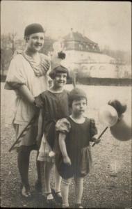 Children in Cute Costumes Holding Balloons c1910 Real Photo Postcard