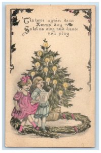 c1910's Christmas Two Little Girls Christmas Tree Candles Antique Postcard