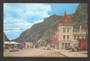 OURAY COLORADO DOWNTOWN STREET SCENE OLD CARS STORES VINTAGE POSTCARD