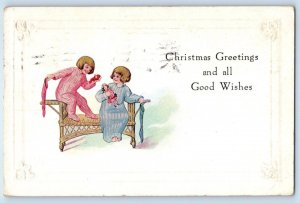 1916 Christmas Greetings Children Playing Doll Toys Embossed New York Postcard