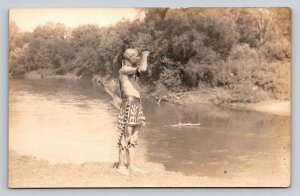 RPPC  Native American Indian  on River   Postcard