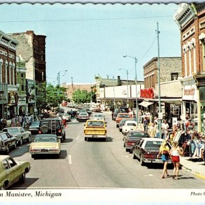 c1980s Manistee, Mich. Downtown Main St Shopping Cars Postcard Store Ford MI A79