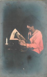 Postcard RPPC hand Tint woman reading newspaper 23-1280