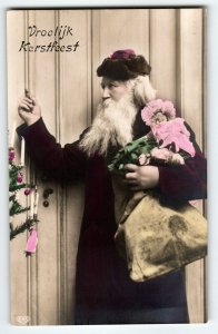 Santa Claus Holding Toy Doll Knocks On Door Christmas Postcard Old World Europe