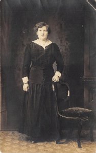 1910s RPPC Real Photo Postcard Woman Dress Chair