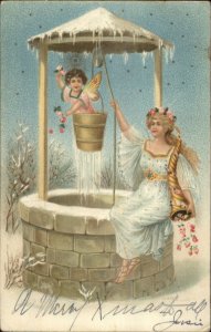 Christmas Beautiful Woman & Cherub at Water Well c1905 Postcard