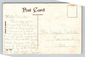 c1910 SANTA CLAUS SLEDDING, TOYS, DOLL, GUN EMBOSSED CHRISTMAS POSTCARD