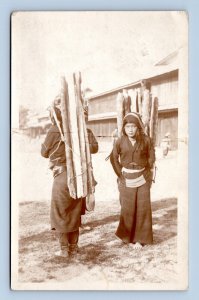 RPPC Myanmar Burma Workers Carrying Packs of Wood 1939 Postcard N7