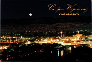 CONTINENTAL SIZE VINTAGE POSTCARD NIGHT VIEW OF CASPER WYOMING