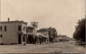 Tiskilwa IL~West Main Street Hitching Posts~Meat Market~Drug Store~1907 RPPC
