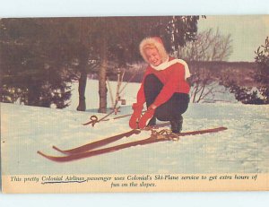 Pre-Chrome SKIING SCENE Postcard Ad - Colonial Airlines Stewardess Skiing AG5366