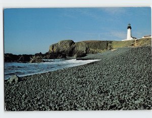 Postcard Yaquina Head lighthouse as seen from Rocky Beach Oregon USA