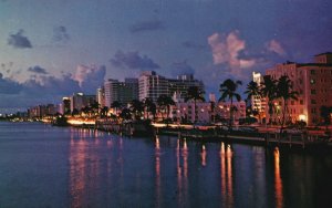 Vintage Postcard Early Evening View Indian Creek Hotel Row in Background Florida