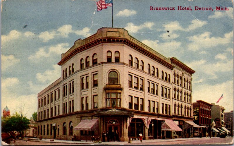 Detroit MI Brunswick Hotel American flag street view corner pedestrians stores