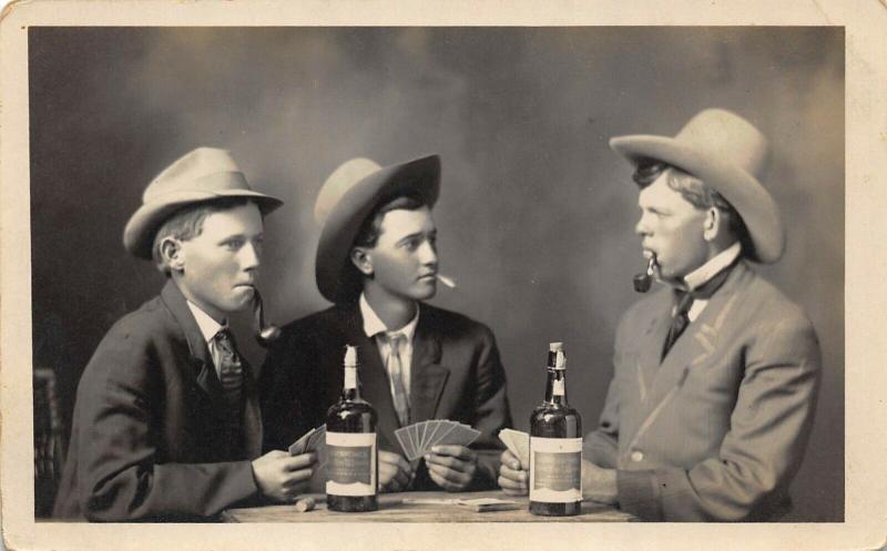 THREE MEN DRINKING AND GAMBLING-EARLY 1900'S RPPC REAL PHOTO POSTCARD