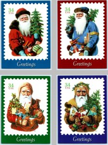 4 Postcards CHRISTMAS SANTAS from 2001 Vintage Postage Stamp Art  5x7