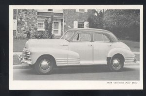 1948 CHEVROLET FOUR DOOR SEDAN VINTAGE CAR DEALER ADVERTISING POSTCARD CHEVY