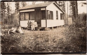 Crystal Lake Saskatchewan Man Woman Big Dogs Cabin Real Photo Postcard H27