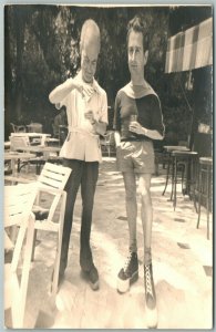 CROOKED MEN'S COUPLE ILLUSION PHOTOMONTAGE ANTIQUE REAL PHOTO POSTCARD RPPC