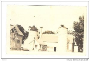 RP; Silos on farm , Canada , 1910s