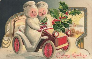 Christmas Greetings Snowman & Snow Woman in Automobile, Embossed Postcard