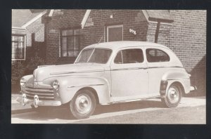 1948 FORD SUPER DELUXE SEDAN VINTAGE CAR DEALER ADVERTISING POSTCARD