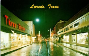 Postcard TX Laredo Convent Avenue Night Scene Three Sisters Store 1960s S62