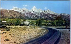 JACKSON HOLE, WY  Wyoming   ROAD, BRIDGE, Mountains   c1950s    Postcard
