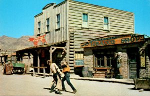 Arizona Old Tucson Actors Performing Fist Fight In Front Of red Dog Saloon