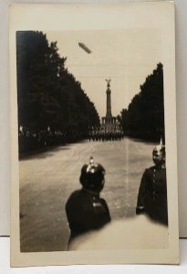RPPC Zeppelin Hindenburg Over Berlin Victory Monument Horse Soldiers Postcard A9