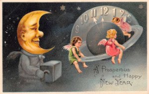 New Year Greetings Moon Man with Angels Clock PFB Vintage Postcard AA82975