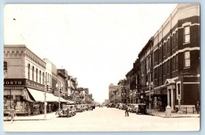 Hastings NE Postcard RPPC Photo Second Street From Lincoln Florsheim Clothing