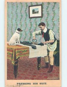 Bamforth comic DOG SITTING ON TABLE WATCHES MAN IRON HIS SUIT HL3279