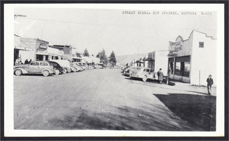 Hot Springs Montana Street Scene Stores and 1940s Cars RPPC Postcard Cecil Nixon