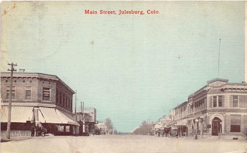 C59/ Julesburg Colorado Co Postcard 1913 Main Street Bank Stores 