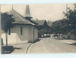 old rppc BUILDINGS ALONG THE STREET Gstaad - Bern Switzerland HM2218