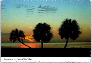 VINTAGE CONTINENTAL SIZE POSTCARD SUNSET ON THE GULF COAST OF MISSISSIPPI