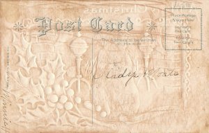 Black cat watching Christmas fire holly postcard ae100