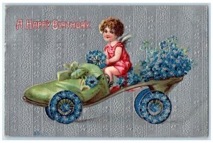 1911 Birthday Angel Riding Shoe Car With Pansies Flowers Des Moines IA Postcard