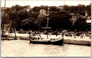 Boats & Ships Along Boardwalk Buildings People Walking Real Photo RPPC Postcard