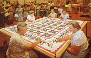 Pennsylvania Dutch Days at Hersheypark - Quilting women around a table showca...